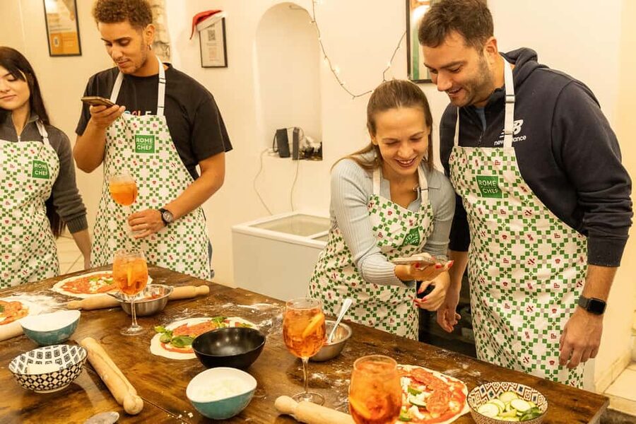Rome: Pizza Making Cooking Class With Spritz Cocktails - The shared dinner is part of the appeal