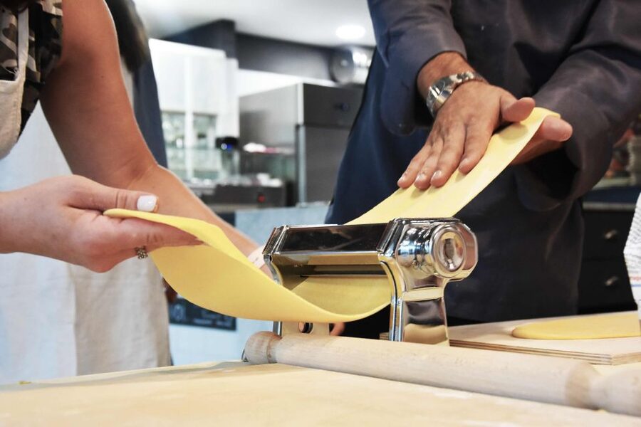 Rome: Small Group Pasta Making Class with Wine near Vatican - Rolling, kneading, and slicing your own fettuccine