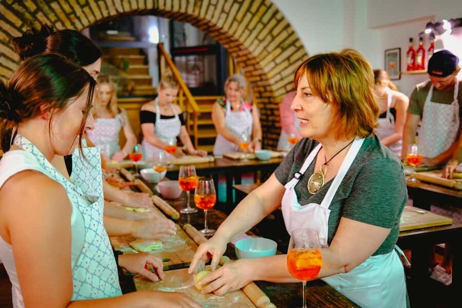 Rome: Spritz & Spaghetti Cooking Class - Making fettuccine instead of just eating it