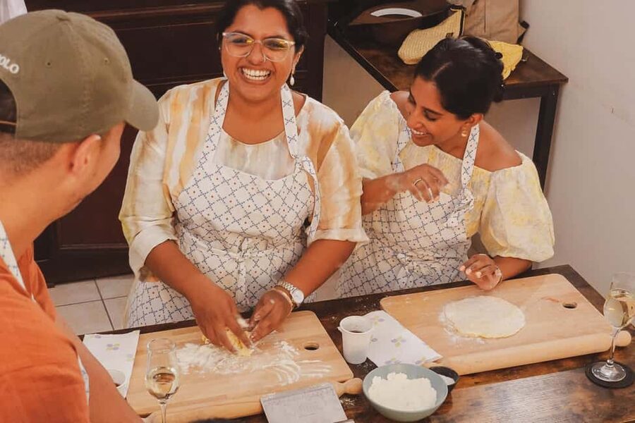 Rome: Traditional Pasta, Spritz & Tiramisu Cooking Class - Small groups, shared tables, and a social mood