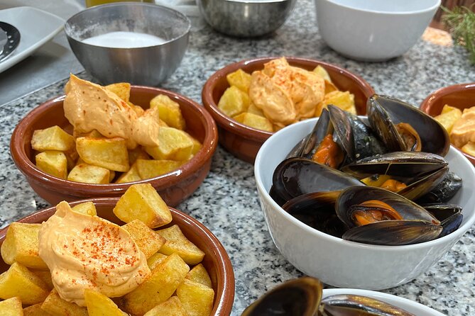 Seafood paella cooking class, tapas and visit to Ruzafa market. - The eight-minute walk to the cooking kitchen