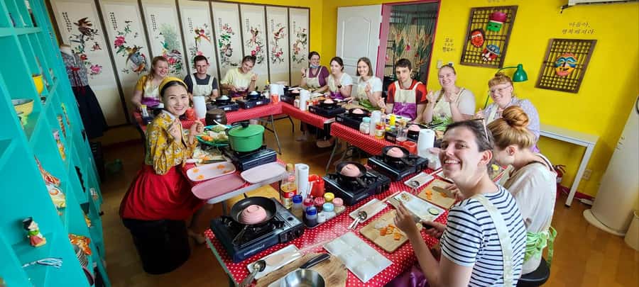Seoul: Korean Cooking Class at a Local Home and Market Tour - Cooking four Korean staples by hand