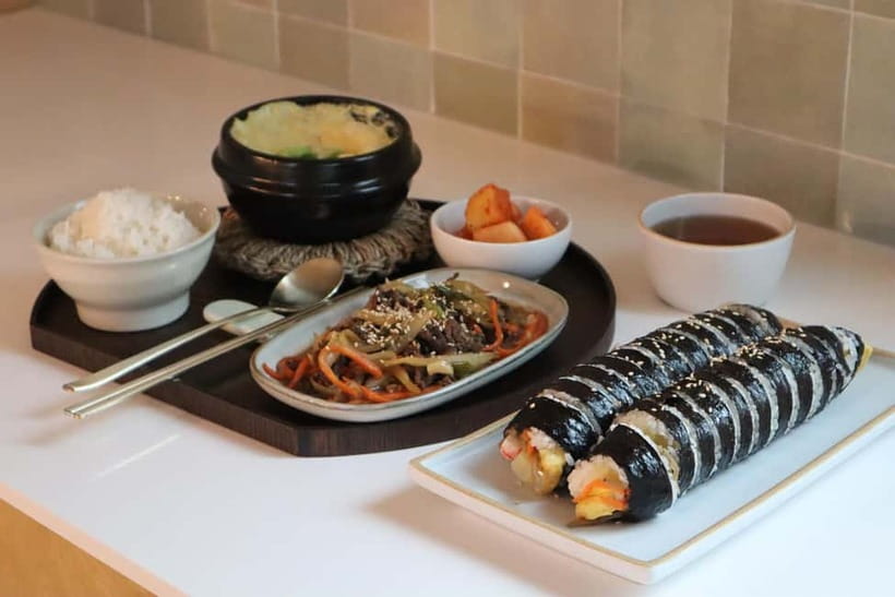 Seoul: Korean Cooking Class with Local Grocery Shopping - Taking kimbap toward the Han River