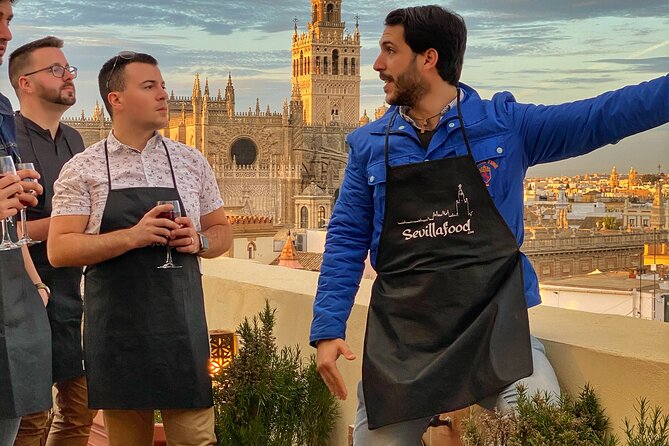 Sevilla: Rooftop Paella Cooking Class & 30-minute expert Q&A - Sunset views, music, and the feel of the evening