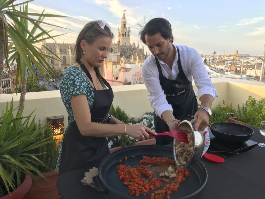 Seville: Paella Cooking Class & 30-Min Local Expert Q&A - A rooftop kitchen above Seville’s old center