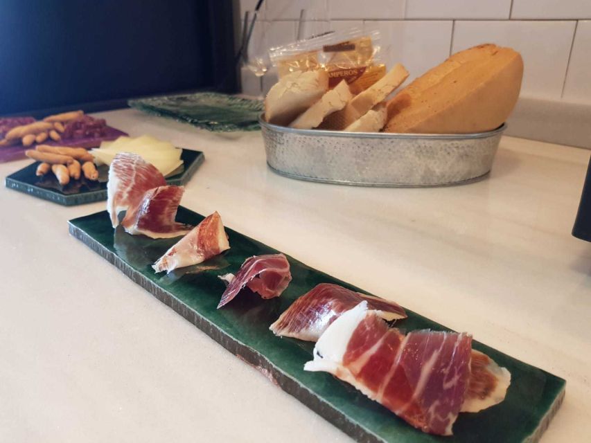 Seville: Paella Showcooking Experience - Timing, booking, and small practical details