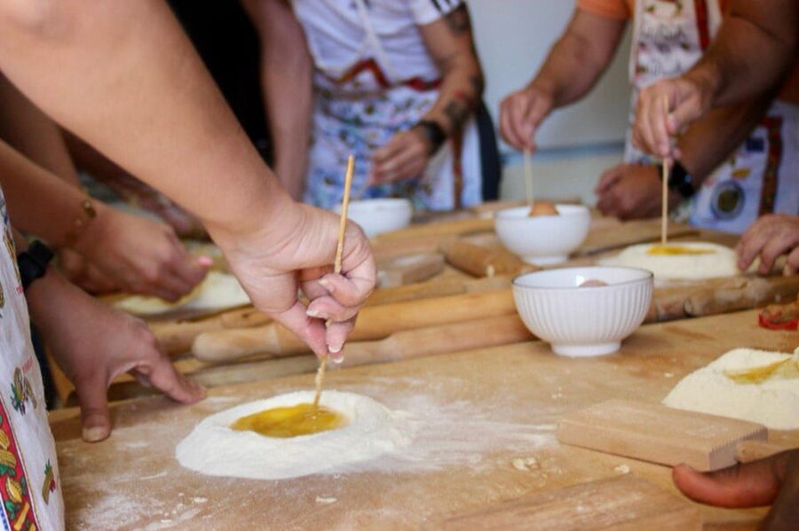 Sicilian Cooking Class with Greek Theatre View - A Sicilian kitchen with the Greek Theatre outside