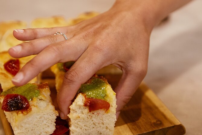 Small Group Cooking Class & Market Food Tour in Florence - Sitting down to eat what you made