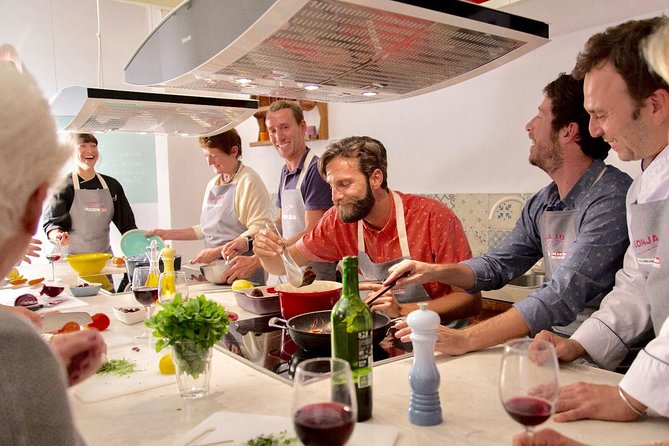 Spanish Cooking Experience in Mallorca - Starting with snacks, wine, and Mallorcan flavor