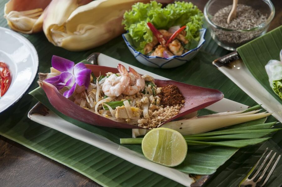 Sukhumvit: Hands-on Thai Cooking Class & Market Tour in BKK - Afternoon and evening classes trade the market for mango carving