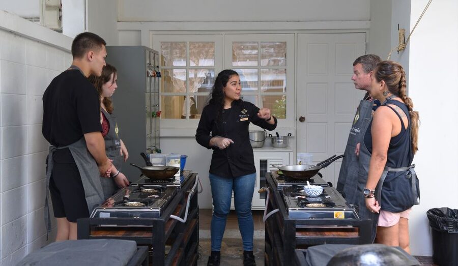 Sukhumvit: Hands-on Thai Cooking Class & Market Tour in BKK - Two hours of cooking, one dish at a time