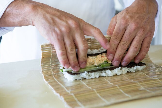 Sushi Making Cooking Class at a Local Brewery in Charlotte - Rolling sushi at Lost Worlds Brewing