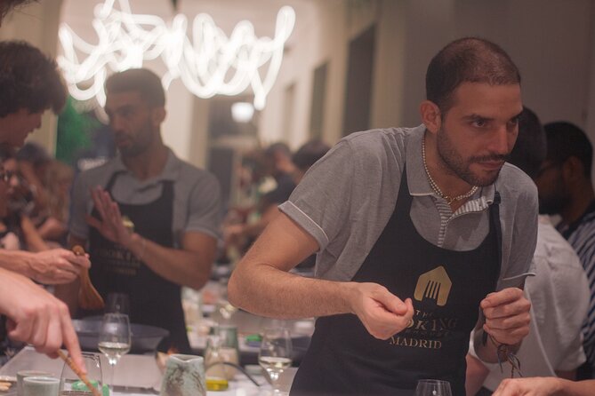 Taste of Spain: Tapas Cooking Class with Bottomless Wine Pairing - Cooking four tapas at Calle de Atocha