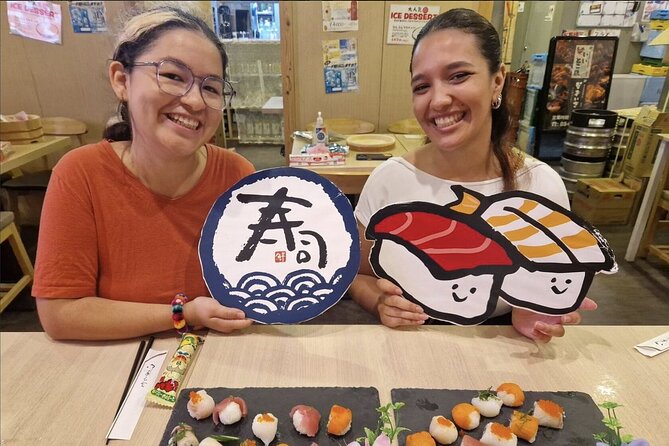 Tokyo: Sushi Making Experience & Japanese Cooking Class - Shaping temari sushi for a second style