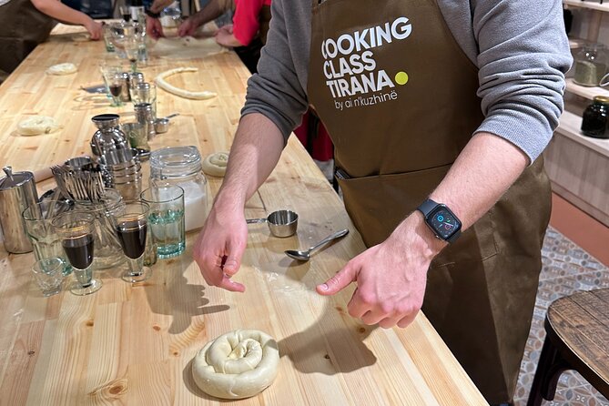 Traditional Albanian Cooking Class in Tirana with Raki Tasting - Making sheqerpare for the final course