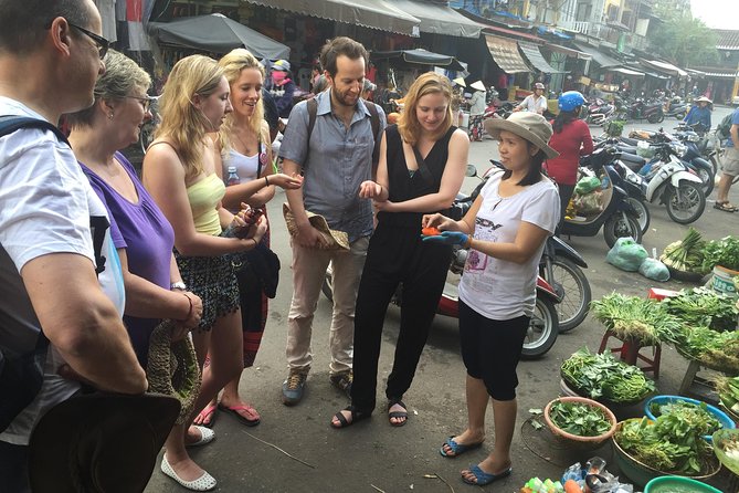 Traditional Cooking Class with Basket Boat Ride and market Tour - Vegetarian meals and family needs
