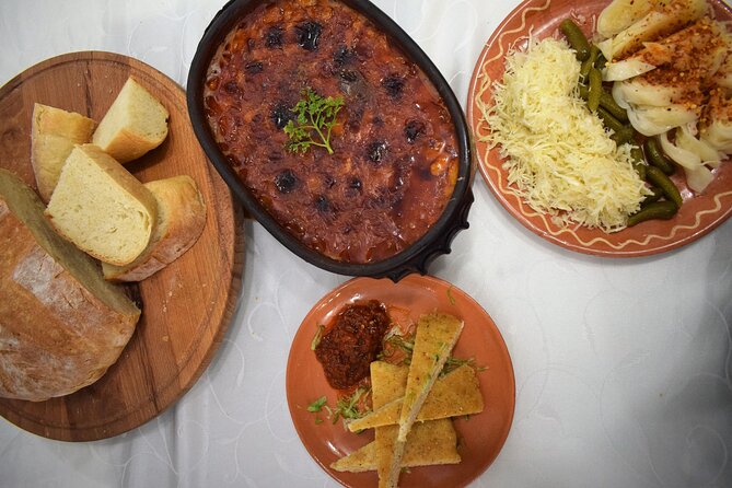 Traditional Serbian Cooking Class in Belgrade with Locals - Baking proja while the main dish cooks