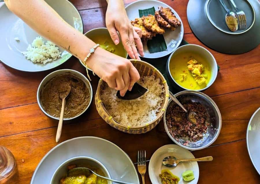 Ubud: Balinese Cooking Class at an Organic Farm - Picking vegetables at the organic farm