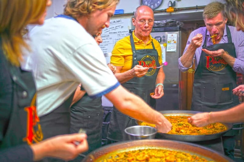 Valencia: Traditional Paella Cooking Class and Dinner - Snacks, tapas, and the first glass of sangria