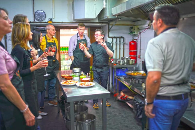 Valencia: Traditional Paella Cooking Class and Dinner - Sitting down to eat what you made