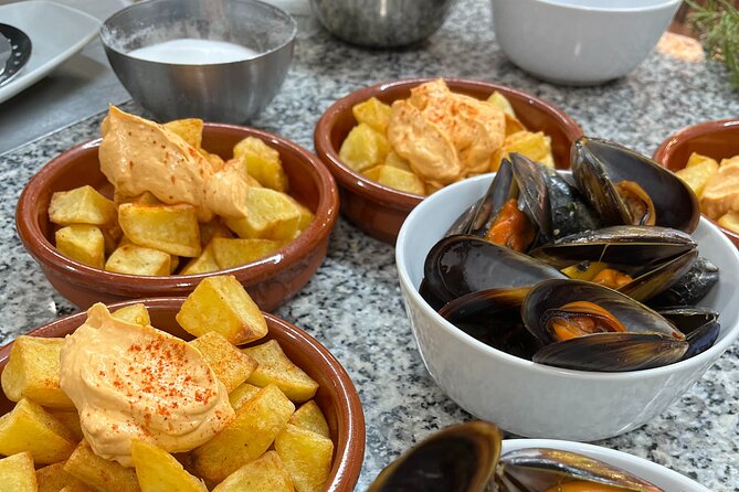 Valencian Paella Cooking Class, Tapas & Sangria - Evening - Group size, timing, and who should book