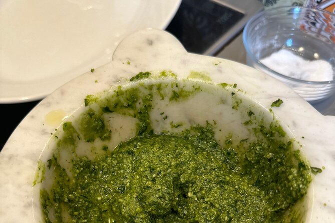 With Tiziana Cooking Class for Pesto , Gnocchi and Tiramisù - Sitting down with Tiziana and Roberto